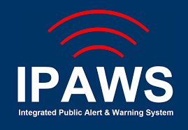 Image of the Integrated Public Alert & Warning System (IPAWS). Red signal symbol of three red curb lines on blue background.